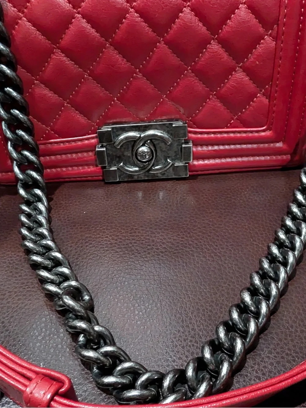 CHANEL Red leather small Boy with gunmetal tone chain